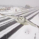 Illustration for article titled A Traffic Camera Captured This Gorgeous Shot of a Snowy Owl in Flight